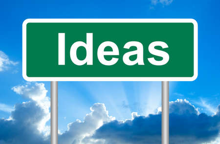 Ideas road sign on blue sky with clouds and clipping pathの写真素材