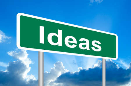 Ideas road sign on blue sky with clouds and clipping pathの写真素材