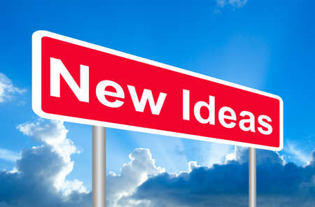 New Ideas road sign on blue sky with clouds and clipping pathの写真素材
