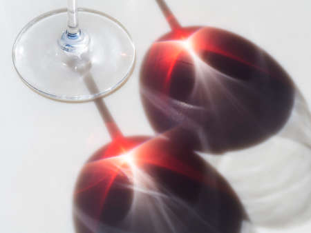 Wine glass reflection on counter topの写真素材