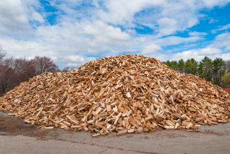 Pile of split fire wood prepared for winterの写真素材