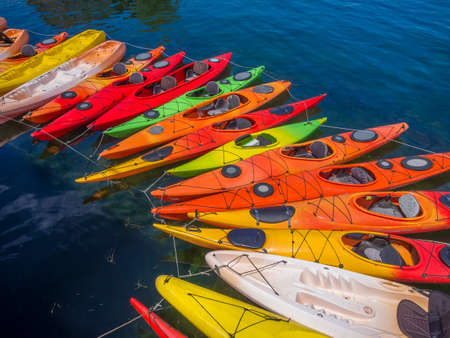 Kayaks forming a graceful arch in the waters of Rockport MA. USAの写真素材