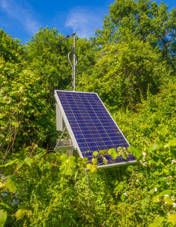 Solar panel in green settingの写真素材