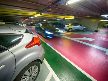 underground parking garage with a moving carのeditorial素材