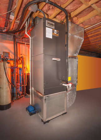 House forced hot air and air conditioning system in basementの写真素材
