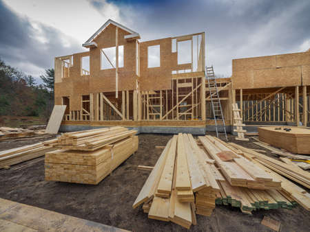 New house construction framing in the city suburbsの写真素材