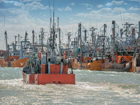 Fishing boat returning to portの写真素材