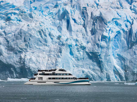Boat sailing near Perito Moreno glacier in Patagonia Argentina.のeditorial素材