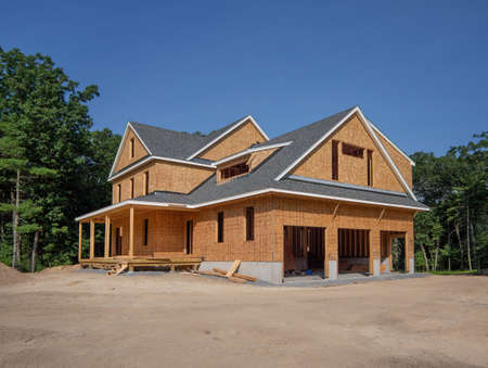 New house construction awaiting siding and landscapingの写真素材