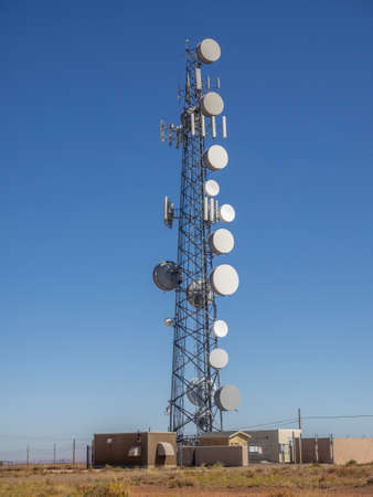 Communication tower on blue sky in desertの写真素材