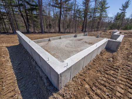 New house foundation wall with underground water proofingの写真素材