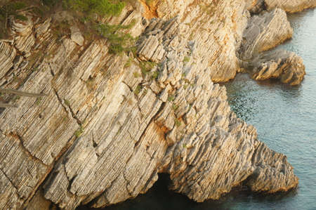 interesting texture of the rock by the seaの写真素材