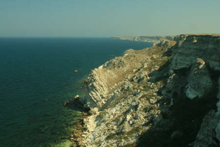 Rock by the sea on a sunny day