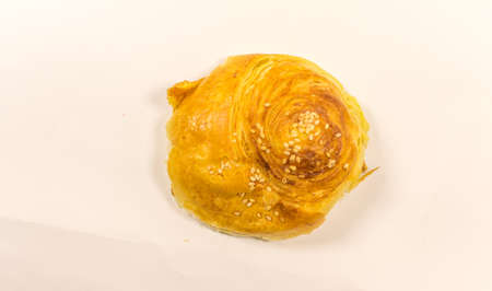 Isolated and macro shot of Novruz holiday cookie shekerbura on white backgroundの写真素材