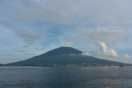 Mount Gamalama in the morning, view  from Tidore Island, Ternate island, North Maluku Indonesiaの写真素材