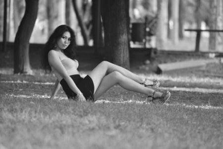 girl in a bright blouse posing in natureの写真素材