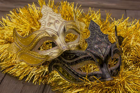 Beautiful New Year's carnival mask on tinsel. close-upの写真素材