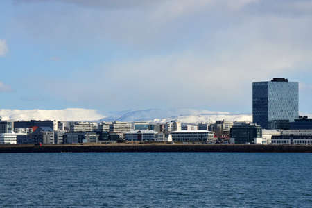 View of the city of Reykjavík ships sailing on the seaの写真素材