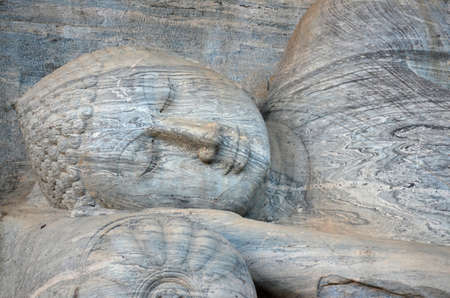Stone buddha lying  in Polonnaruwaの写真素材