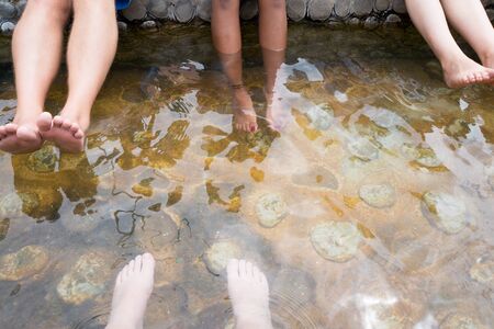Feet in hot waterの写真素材