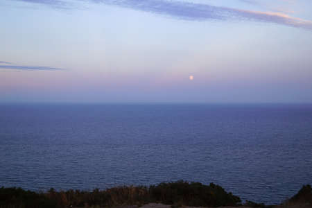 The town of Howth is located on the peninsula Howth Head directly opposite the Dublin district of Sutton and is connected to the mainland via a dam. The Baily Lighthouse stands on a promontory and is well visible from the Hill of Howth.の写真素材