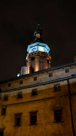 Bernardine Church Tower in Lviv at night with blue illuminationの写真素材
