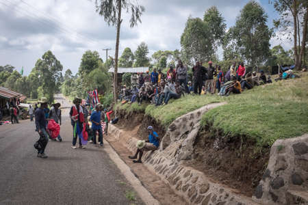 Machame, Kilimanjaro/Tanzania - January 16, 2016: Porters and guides meeting before climbing Kilimanjaro near Machame gate in Kilimanjaro/Tanzania on January 16, 2016のeditorial素材