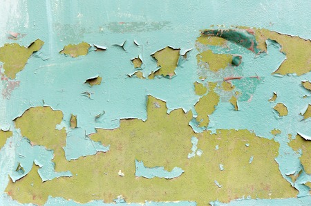 Grunge bright background with green color and many scratchesの写真素材