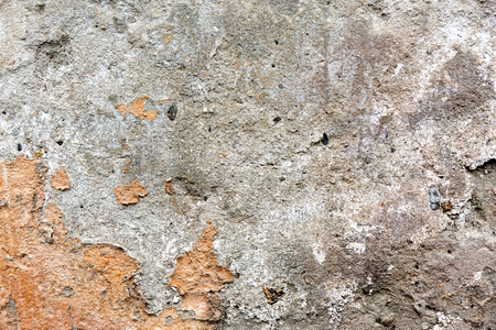Grunge cracked concrete wall. Destroyed gray surface.の写真素材