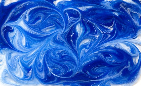 Blue liquid texture, watercolor hand drawn marbling illustration, abstract background.の写真素材