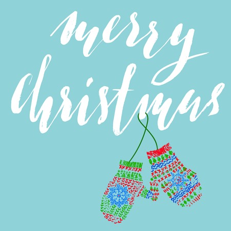 Merry Christmas. Modern calligraphy for Christmas cards and posters. Vector lettering with cute mitten pair. EPS10のイラスト素材