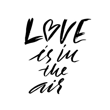 Hand lettered inspirational quote. Love is in the air. Hand brushed ink lettering. Modern brush calligraphy. Vector illustrationのイラスト素材