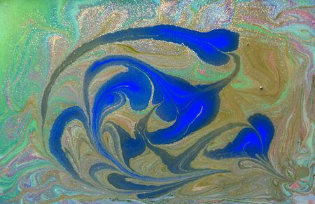Green and blue liquid texture. Hand drawn marbling background. Ink marble abstract patternの写真素材
