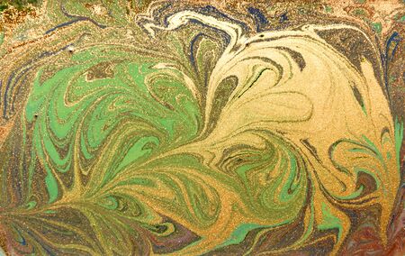 Green and golden liquid texture. Hand drawn marbling background. Ink marble abstract patternの写真素材