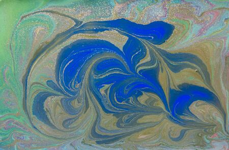 Green and blue liquid texture. Hand drawn marbling background. Ink marble abstract patternの写真素材