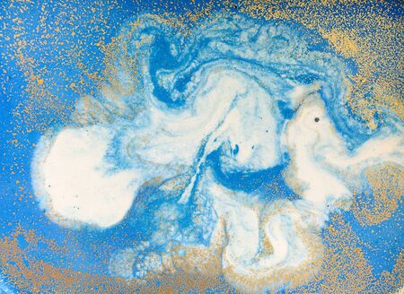 Blue and golden liquid texture, watercolor hand drawn marbling illustration, abstract backgroundの写真素材