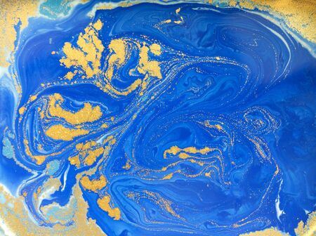 Blue and golden liquid texture, watercolor hand drawn marbling illustration, abstract backgroundの写真素材