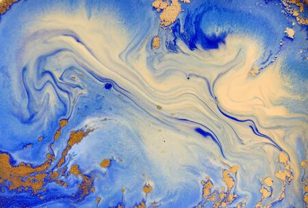 Blue and golden liquid texture. Watercolor hand drawn marbling illustration. Ink marble background.の写真素材