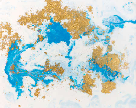 Blue, white and golden liquid texture. Watercolor hand drawn marbling illustration. Ink marble background.の写真素材