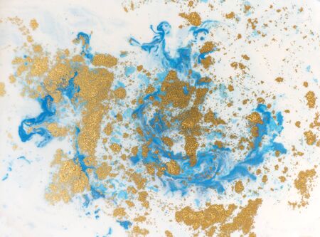 Blue, white and golden liquid texture. Watercolor hand drawn marbling illustration. Ink marble background.の写真素材