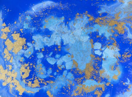 Blue and golden liquid texture. Watercolor hand drawn marbling illustration. Ink marble background.の写真素材