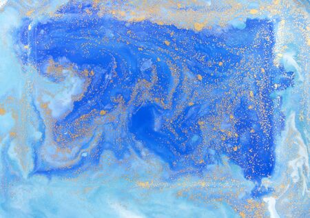 Blue and golden liquid texture. Watercolor hand drawn marbling illustration. Ink marble background.の写真素材