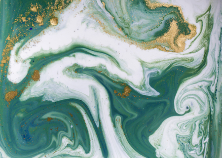 Marbled green and golden abstract background. Liquid marble pattern.の写真素材