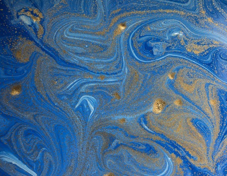 Marbled blue and golden abstract background. Liquid marble patternの写真素材
