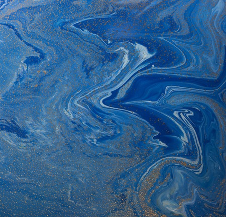Marbled blue and golden abstract background. Liquid marble patternの写真素材