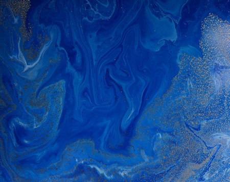 Marbled blue and golden abstract background. Liquid marble pattern