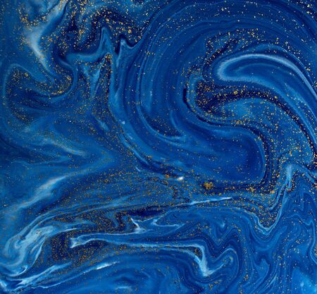Marbled blue and golden abstract background. Liquid marble patternの写真素材