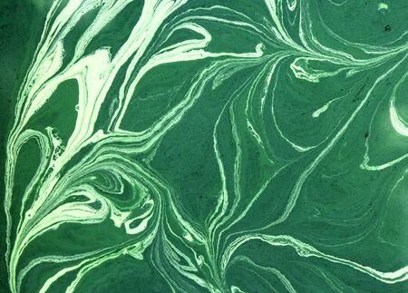 Marbled green abstract background. Liquid marble patternの写真素材