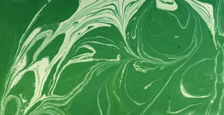 Marbled green abstract background. Liquid marble pattern.の写真素材
