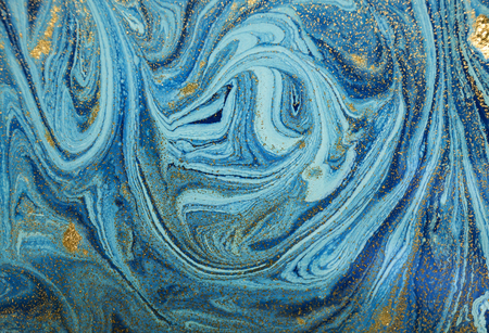 Marbled blue and golden abstract background. Liquid marble patternの写真素材
